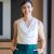 smiling-in-office-businesswoman-wearing-white-blo-2026-03-25-01-19-58-utc